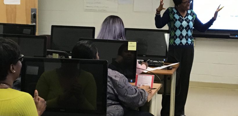 TBG President Vivica Brooks share a moment with students